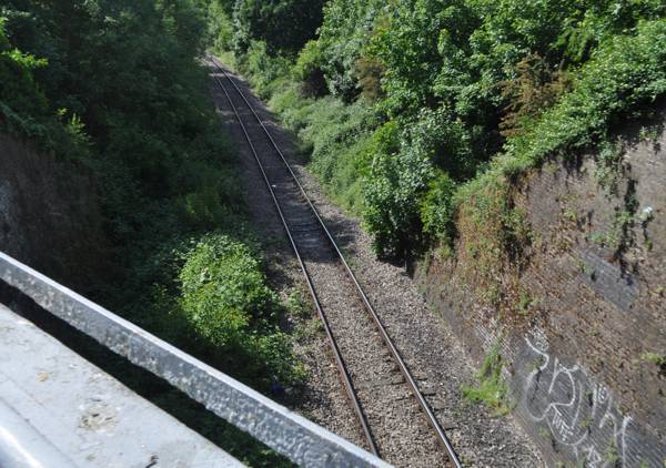 Three Bridges - railway below, Norwood Green Single-track railway in cutting below