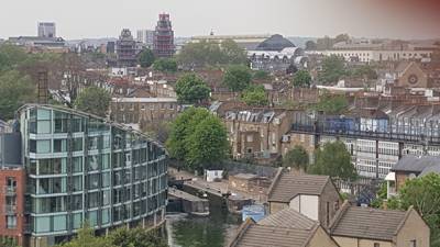 Aerial view of basin area, the lock surrounded by modern buildings