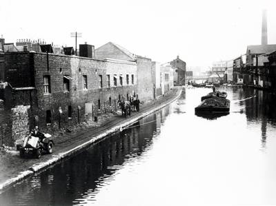 A barge on the canal above Sturt's Lock, c 1950s.