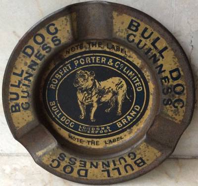 Round faded ash tray, Porter and Co