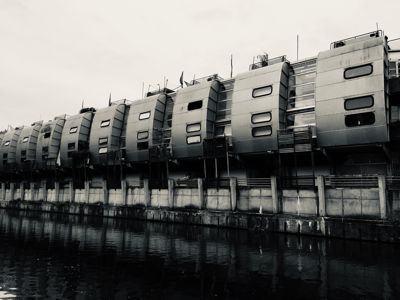 Black and white atmospheric image of flats beside the canal at Camden